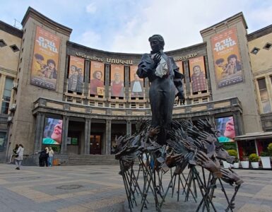 Statue of Charles Aznavour in front of Cinema Moscow in Yerevan, Armenia, honoring the legendary French-Armenian singer, songwriter, and cultural icon