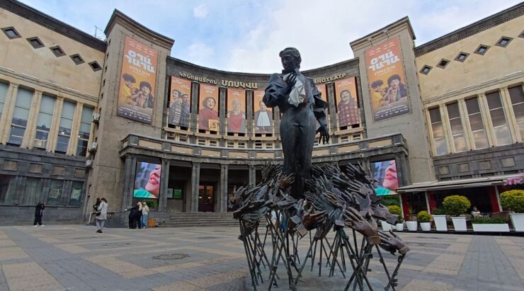 Statue of Charles Aznavour in front of Cinema Moscow in Yerevan, Armenia, honoring the legendary French-Armenian singer, songwriter, and cultural icon