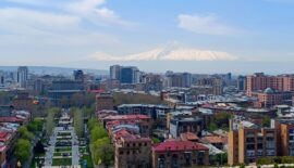 Yerevan cityscape at dusk from Cascade with Mount Ararat in background, Armenia